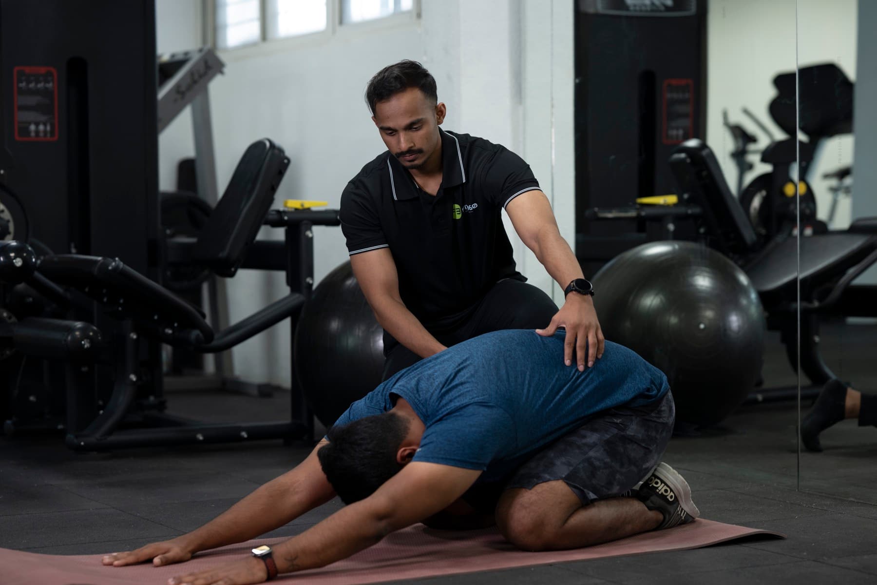 Mat work and corrective exercise for a client with chronic lower back pain