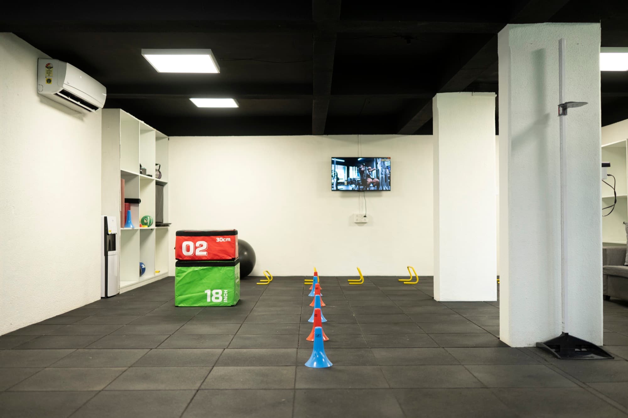 FIT360 private studio interior on Grant Rd, EON Free Zone — equipment laid out for a one-on-one session